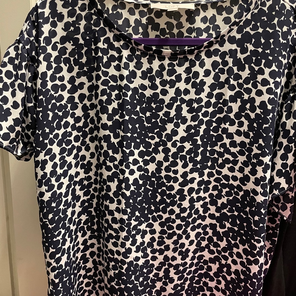 Cute short sleeve blouse.